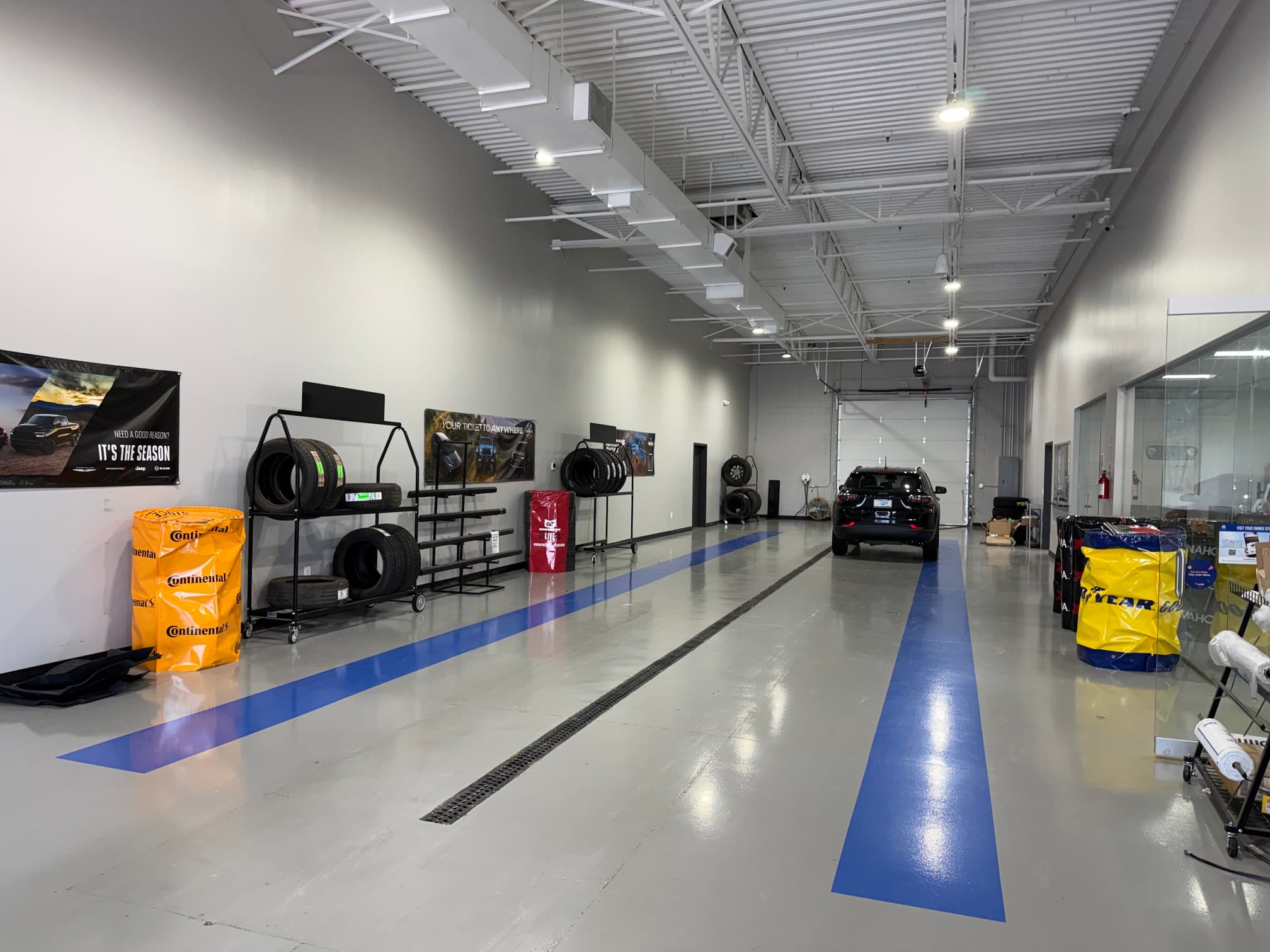 The clean, organized service bays and floor at Odessa Auto & Truck Repair